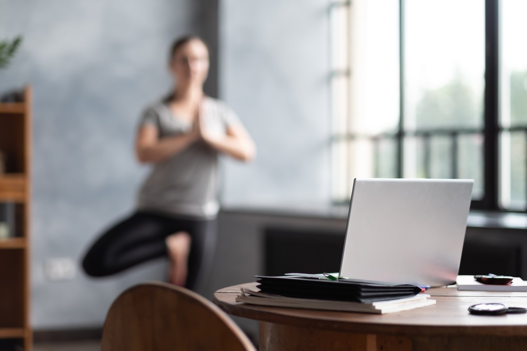 Woman Stretching while Taking a Break from Work 